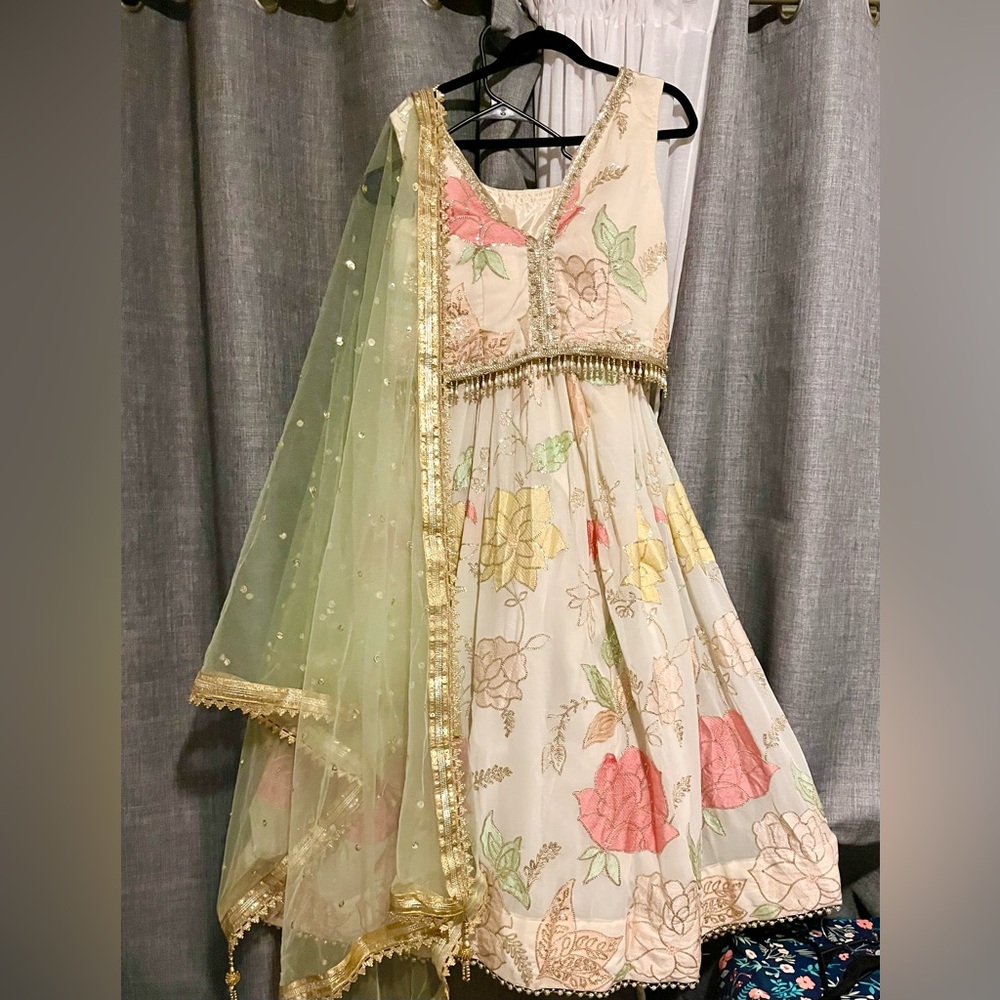 Extremely beautiful and classy cream lengha with handwork and embroidered